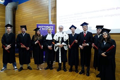 I vincitori del Phd Award, da sinistra Georgios Giamagas, Francesco Ceretti, Costanza Ziani, Francesco Pitassio, Angelo Montanari, Roberto Maria Rosati, Andrea Conzutti, Gabriele Coluccino, Marianna Tagliasco